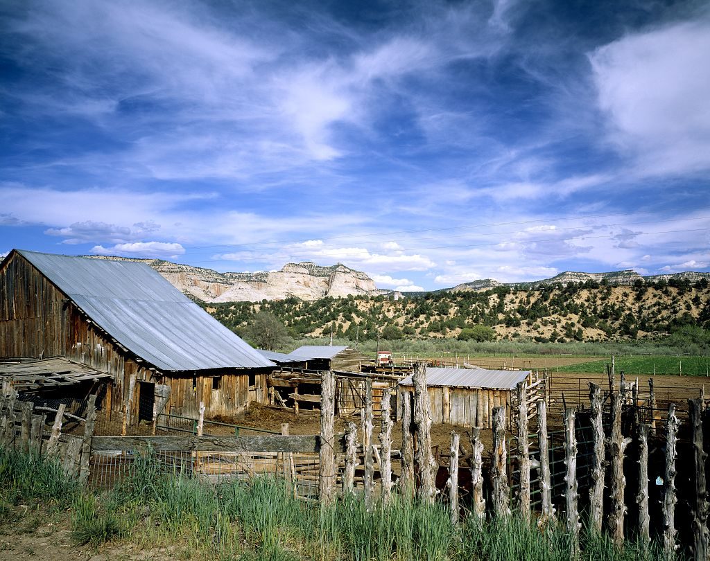 An old farmstead in Mt. Carmel, Utah, with barns and dry-country ground.